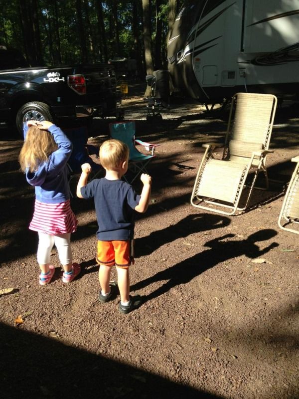 Playing with their shadows (ballerina and muscle man).  Beautiful weather for camping photo 1150921_10201070720183391_574874221_n.jpg