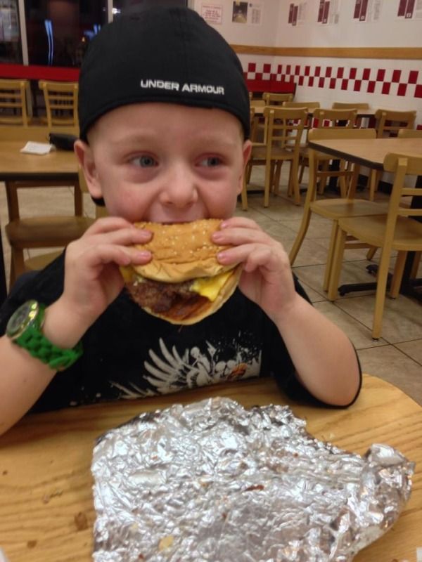 I think hell is freezing over.  Jack is eating a bacon cheeseburger. photo 1530404_10202037011180062_861662973_n.jpg