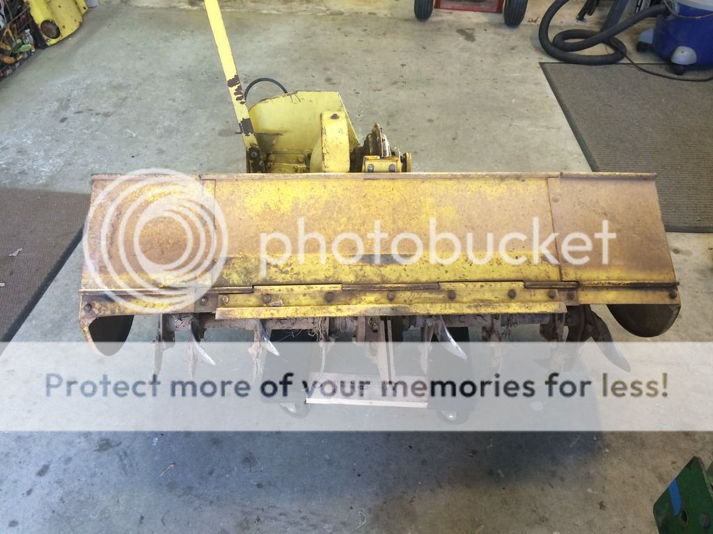 Second, I see it snaps on to pegs on the back of the tractor like my sleeve  hitch. But there are another set of holes there, Does it also get bolted?